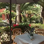 Tropical Garden Retreat: Private Terrace & Pool Oasis Apartment